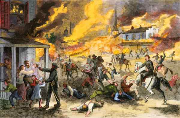 De Quantrill’s Raiders, een Zuidelijke guerrillagroep, richten een bloedbad aan onder de burgerbevolking van Lawrence, K